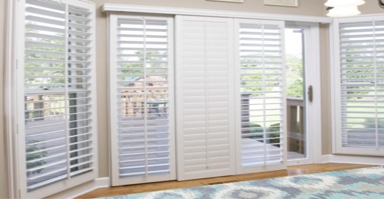 [Polywood|Plantation|Interior ]211] shutters on a sliding glass door in Orlando